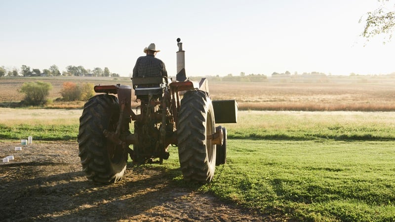 A farmer on a tractor