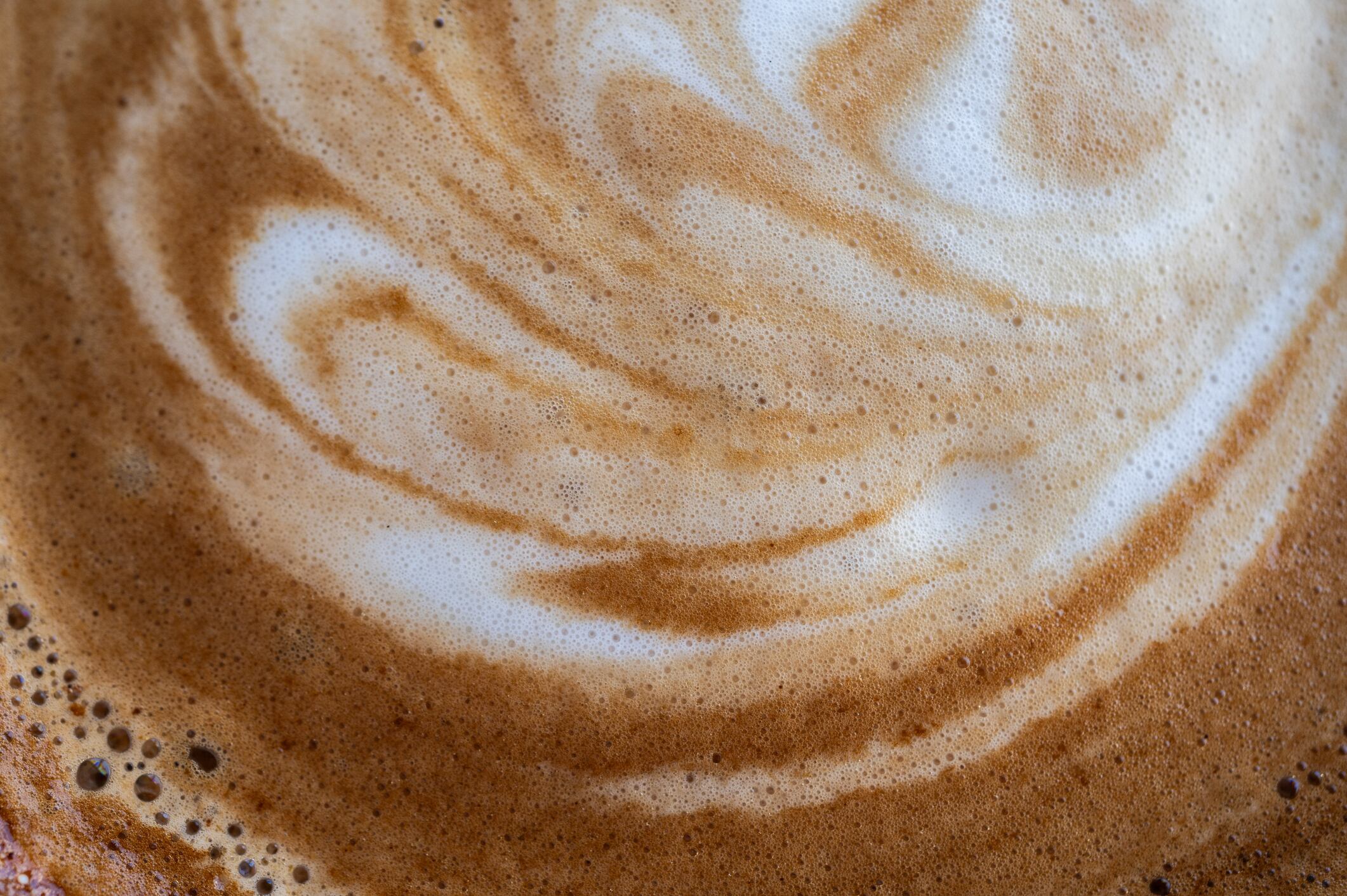 A latte is a coffee drink made with espresso and steamed milk.