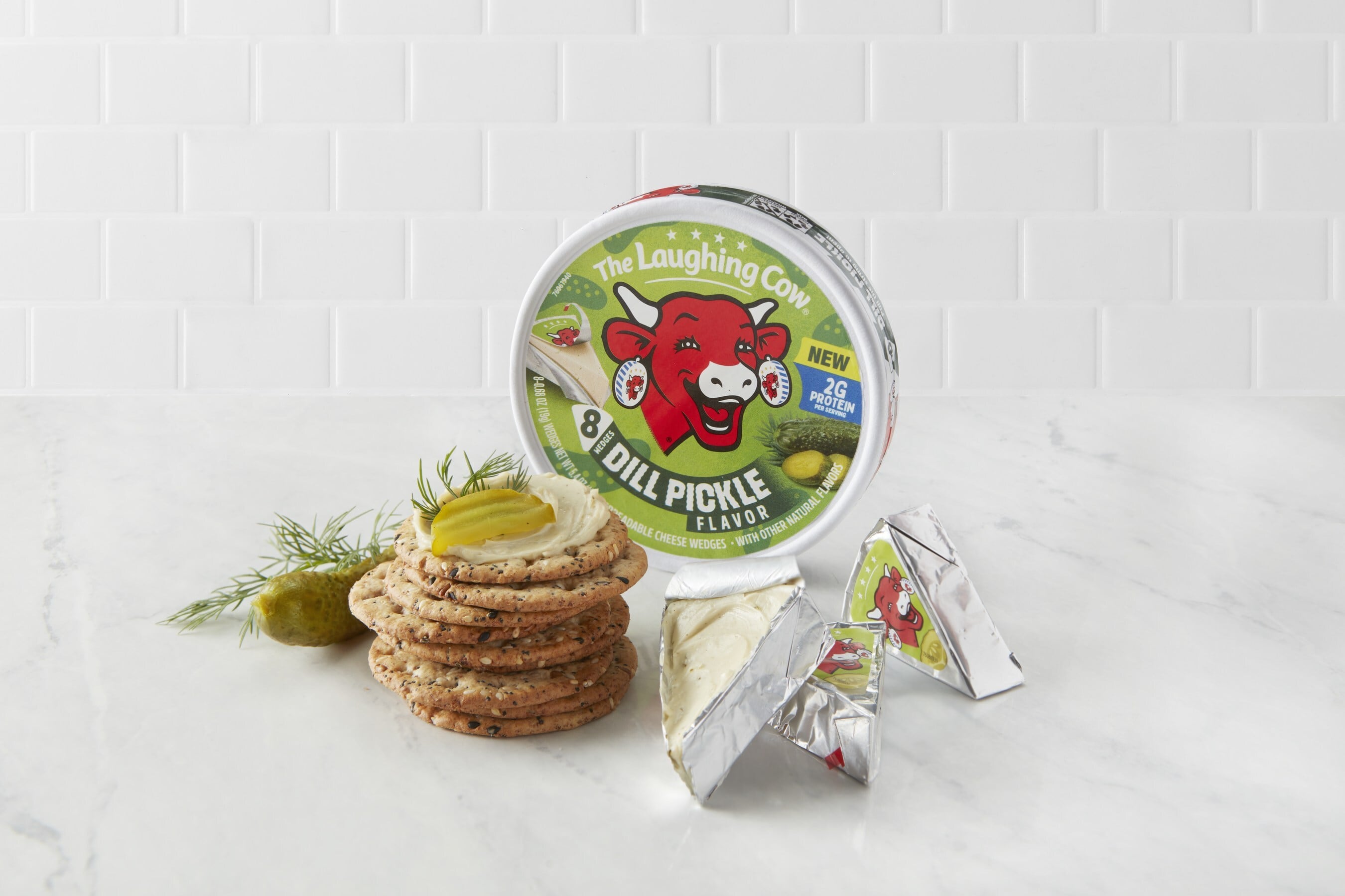 The Laughing Cow Dill Pickle Flavor blends bold dill pickle flavor with the brand’s signature creamy texture in perfectly portioned wedges