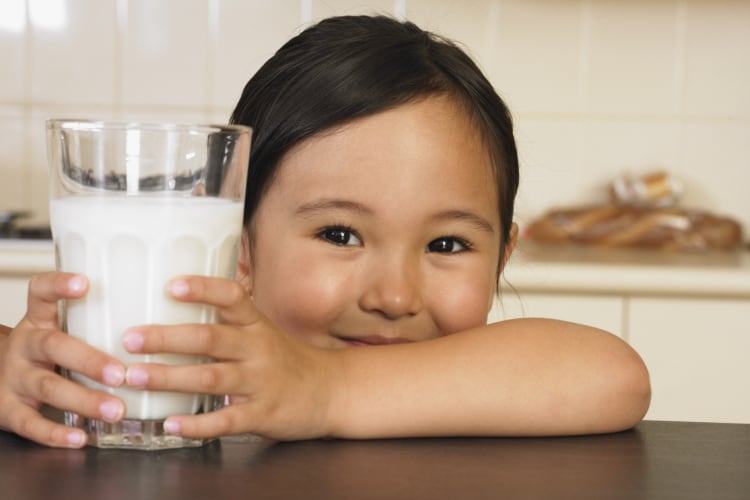 Getty-Images-Dave-and-Les-Jacobs-milk-dairy-child-asia.png