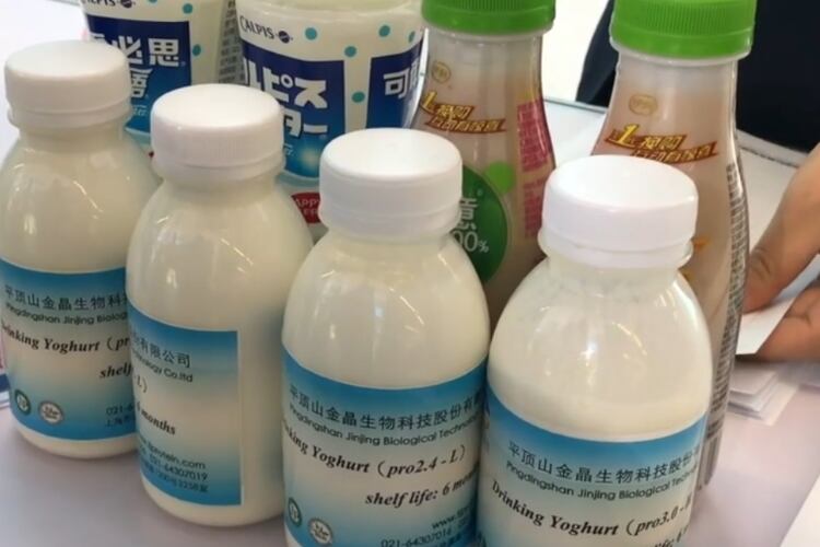 Soluble soy polysaccharides stabilizers for acidic milk drinks