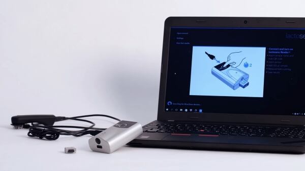 LactoSens-device-with-notebook.jpg
