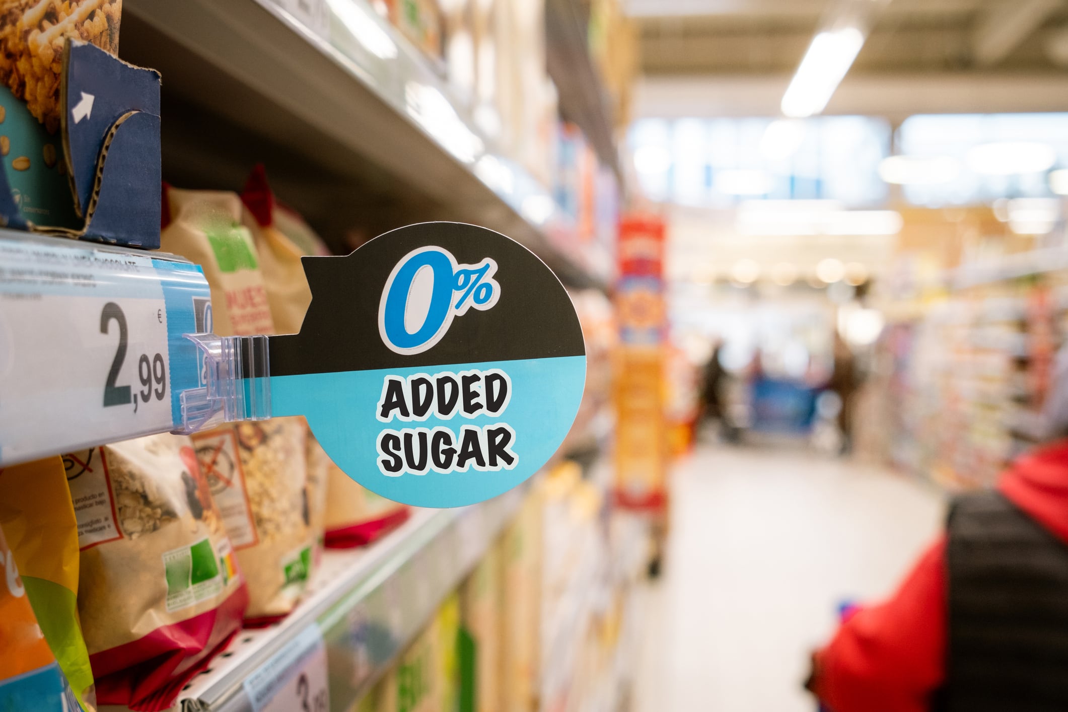 0% added sugar sign in a supermarket.