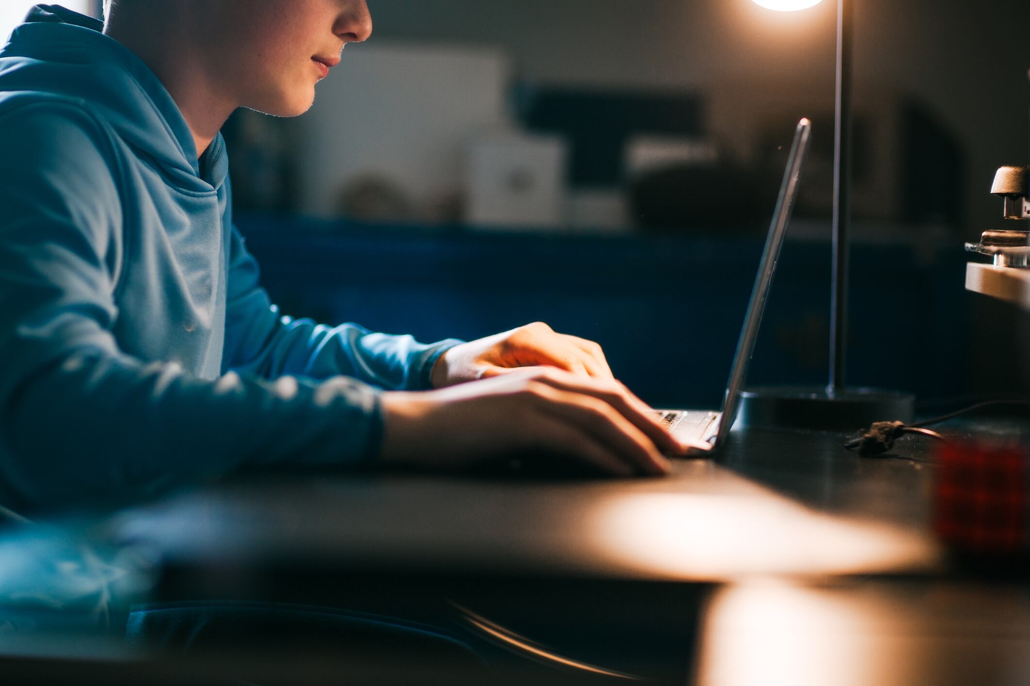 teenage boy on the computer researching creatine