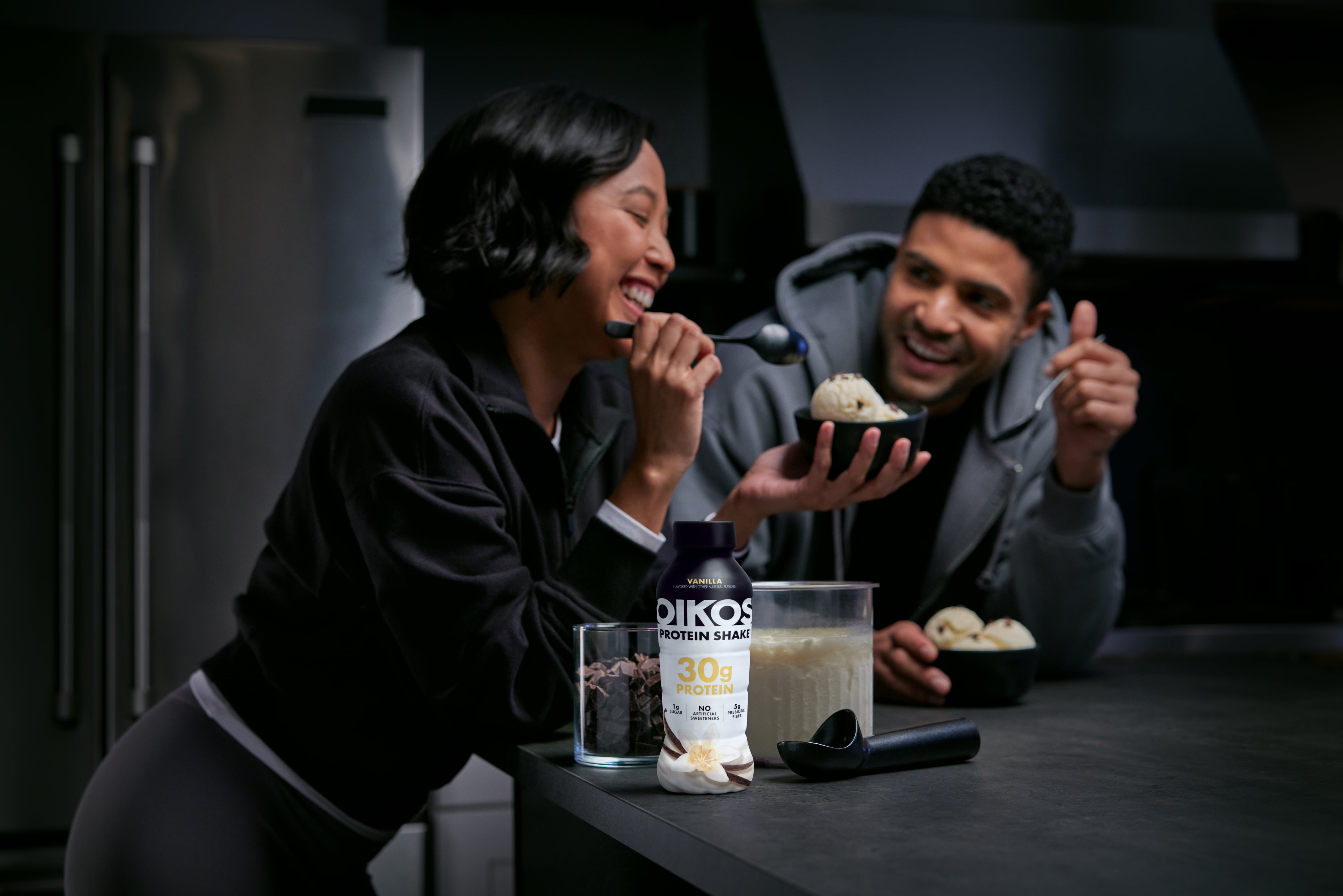 People drinking protein shakes and eating ice cream