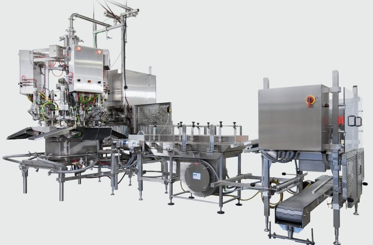 Liquibox upgrades safety and efficiency features of Liquibox Orbiter automatic six-head rotary filler