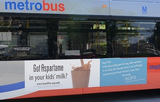 Bus ad campaign urges FDA to reject flavoured milk sweetener petition 