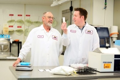High Desert Milk CEO and co-founder Randy Robinson and Brandon Carter, director of R&D, examine a milk sample in the cooperative’s processing plant’s lab. Pic: Dairy West