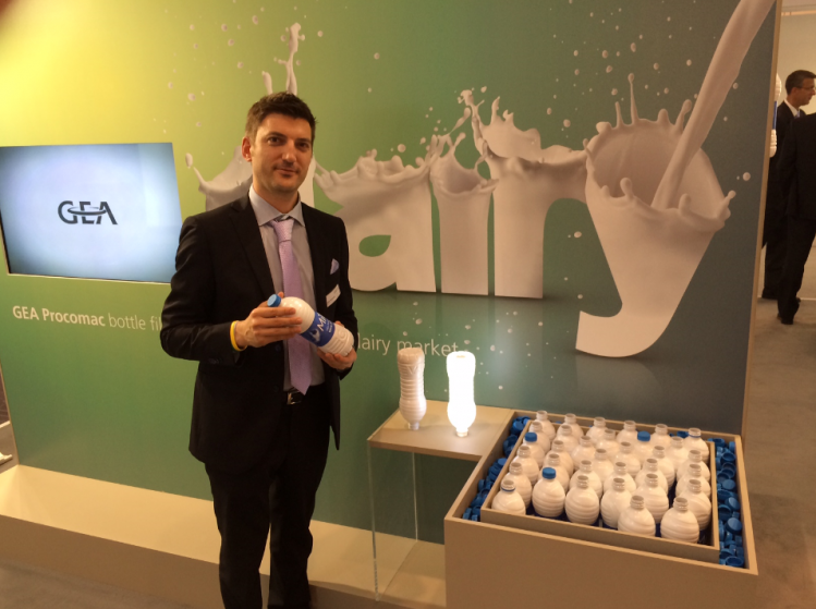 Paolo Ventrelli demonstrates the light barrier qualities of White & Safe at Interpack 2014
