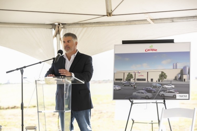 Cacique CEO Gil de Cardenas addresses attendees at a groundbreaking ceremony for the company’s new dairy processing facility in Amarillo, Texas.