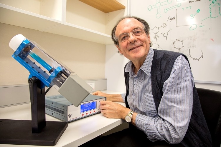 Professor of Clean Technology at Flinders University, Colin Raston, with a vortex fluidic device. Pic: Flinders University