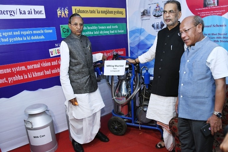 The Union Minister for Agriculture and Farmers Welfare, Shri Radha Mohan Singh, centre, the Governor of Meghalaya, Shri Ganga Prasad, left, and Deputy Chief Minister of Meghalaya, Shri Prestone Tynsong, right, at the exhibition stalls at the launch of the Meghalaya Milk Mission, in Shillong, Meghalaya, on July 28, 2018.