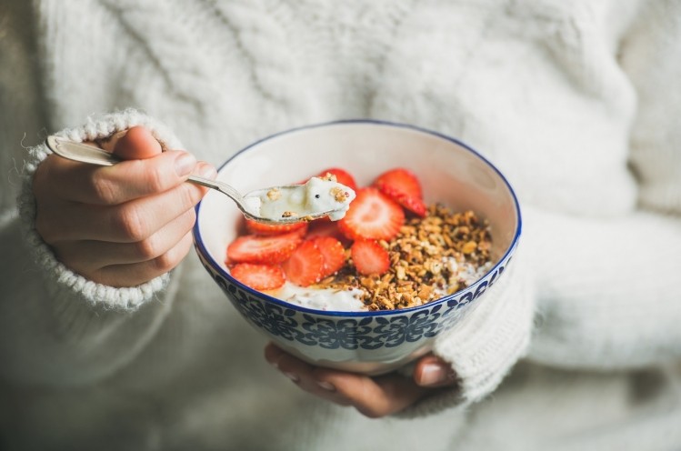 More study respondents reported mixing in their own extra ingredients themselves rather than buy yogurt with prepackaged add ins and toppings. ©GettyImages/Foxys_forest_manufacture