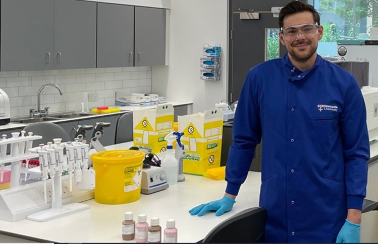 Kieran Smith in the lab with the protein shots. ©Kieran Smith/Newcastle University