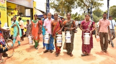 Dairy farmers in Vaddakkachchi, Sri Lanka, where a new Nestlé milk chilling facility has opened