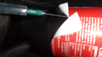 Picture: Allegedly showing the group injecting a Coke bottle with hydrochloric acid